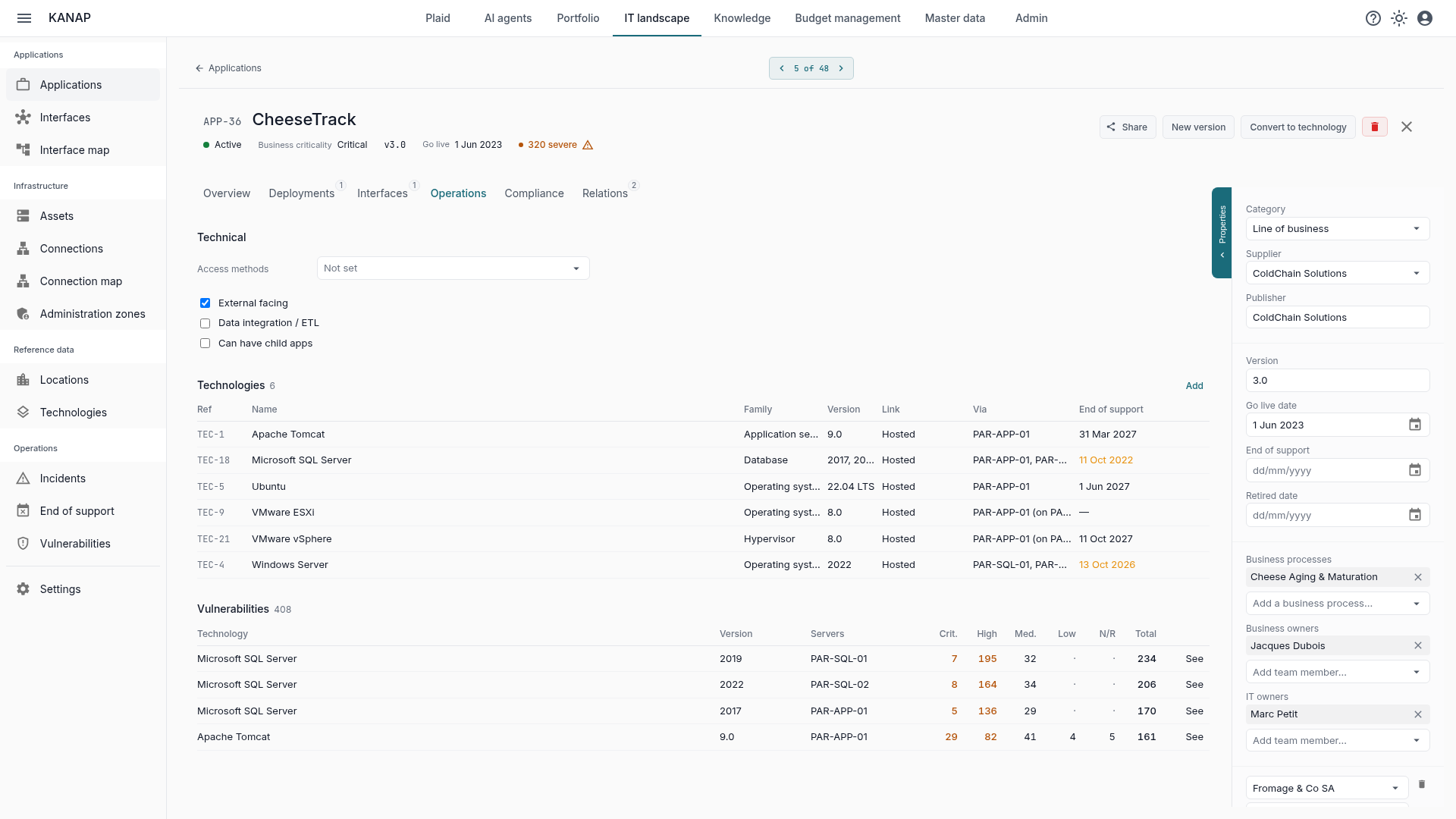 A business application record shows its vulnerabilities and the badge for severe ones.